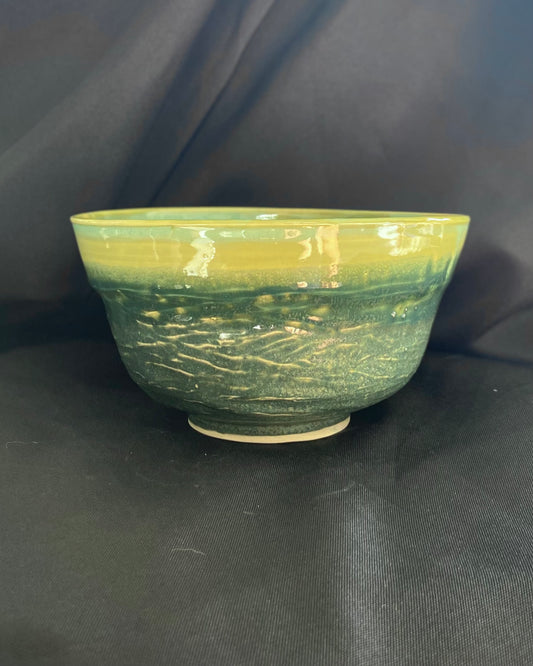 Agate glaze wabi sabi ceramic bowl, matte, satin and gloss multi-textured finish. Hand carved surface with dripping celadon pooling over the lip, blue, green, teal intermingled. Fired to cone 5.