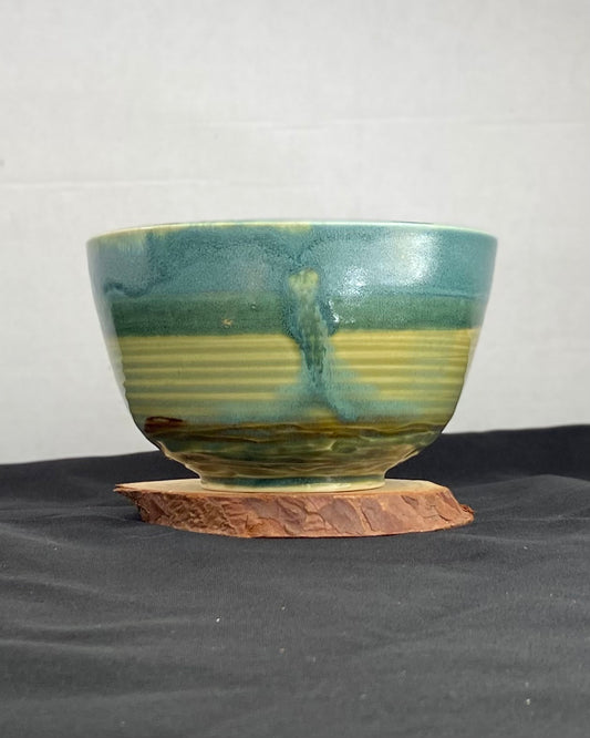 Handmade ceramic ocean bowl with hand-carved ripple texture, and antique blue satin and celadon froth gloss glaze