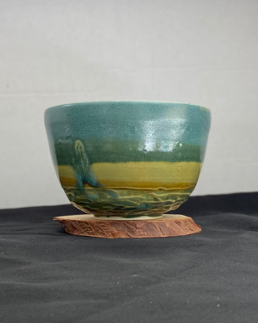 Handmade ceramic ocean bowl with hand-carved ripple texture, and antique blue satin and celadon froth gloss glaze