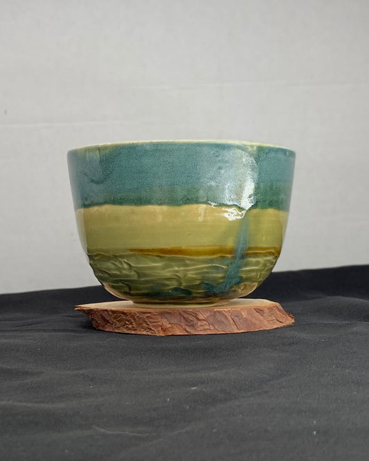 Handmade ceramic ocean bowl with hand-carved ripple texture, and antique blue satin and celadon froth gloss glaze