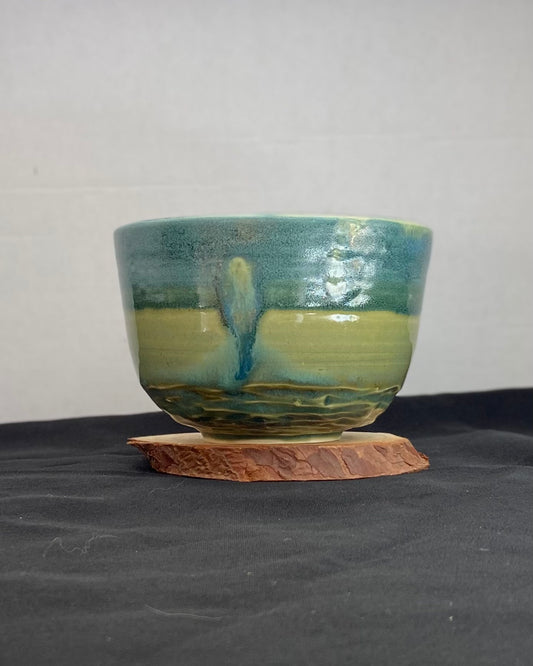 Handmade ceramic ocean bowl with hand-carved ripple texture, and antique blue satin and celadon froth gloss glaze