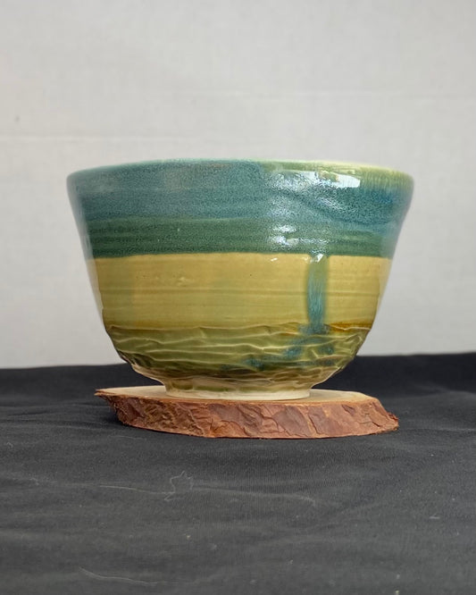 Handmade ceramic ocean bowl with hand-carved ripple texture, and antique blue satin and celadon froth gloss glaze