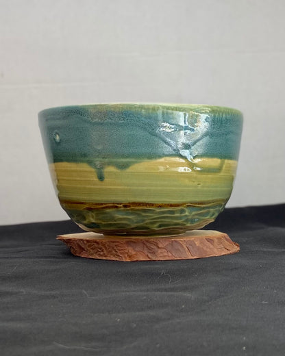 Handmade ceramic ocean bowl with hand-carved ripple texture, and antique blue satin and celadon froth gloss glaze