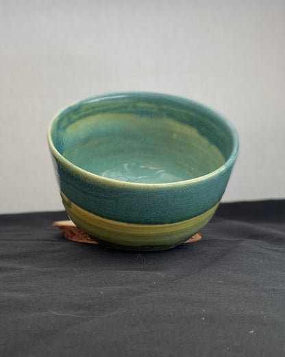 Handmade ceramic ocean bowl with hand-carved ripple texture, and antique blue satin and celadon froth gloss glaze