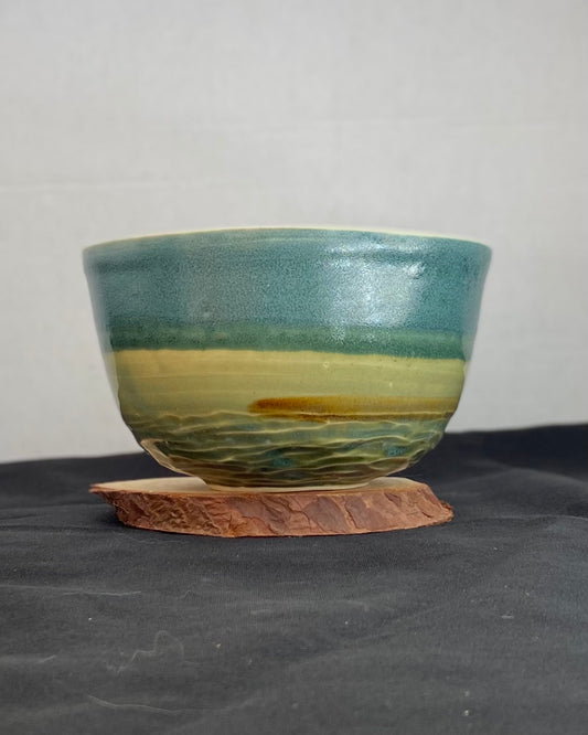 Handmade ceramic ocean bowl with hand-carved ripple texture, and antique blue satin and celadon froth gloss glaze